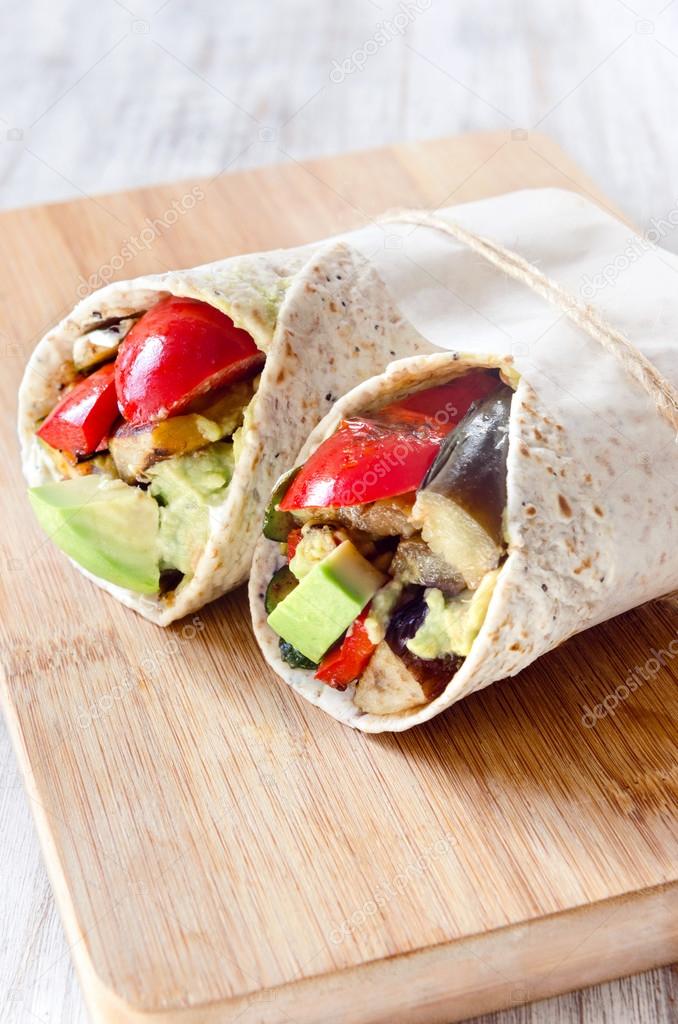 Healthy burrito wraps with roasted vegetables 