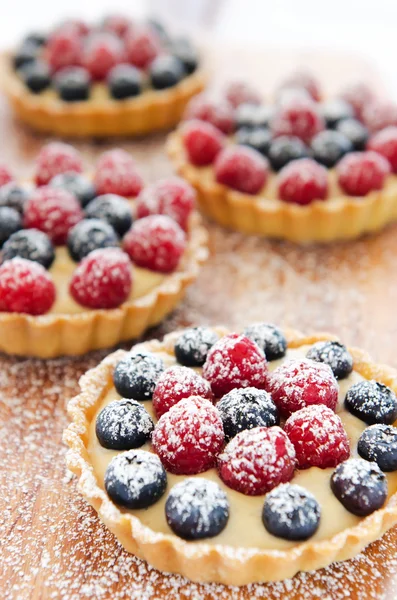 Icing taburan pada tarts — Stok Foto