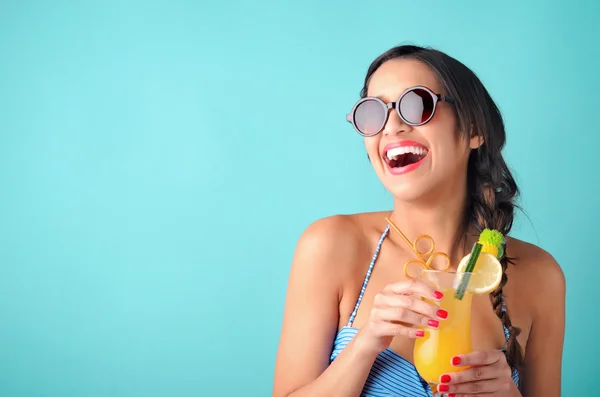 Woman drinking a cocktail — Stock Photo, Image