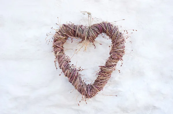 Heart on white wall — Stock Photo, Image