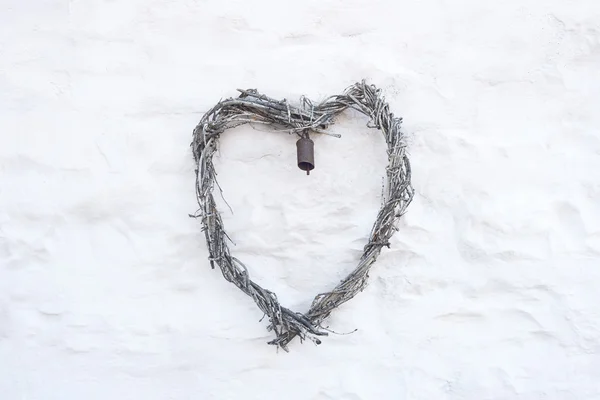 Heart on white wall — Stock Photo, Image