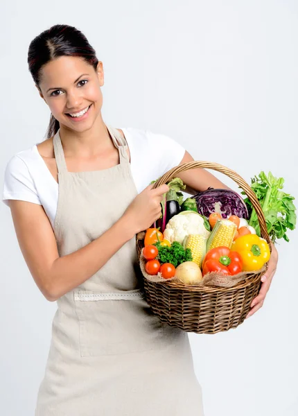 Donna sorridente con prodotti freschi — Foto Stock