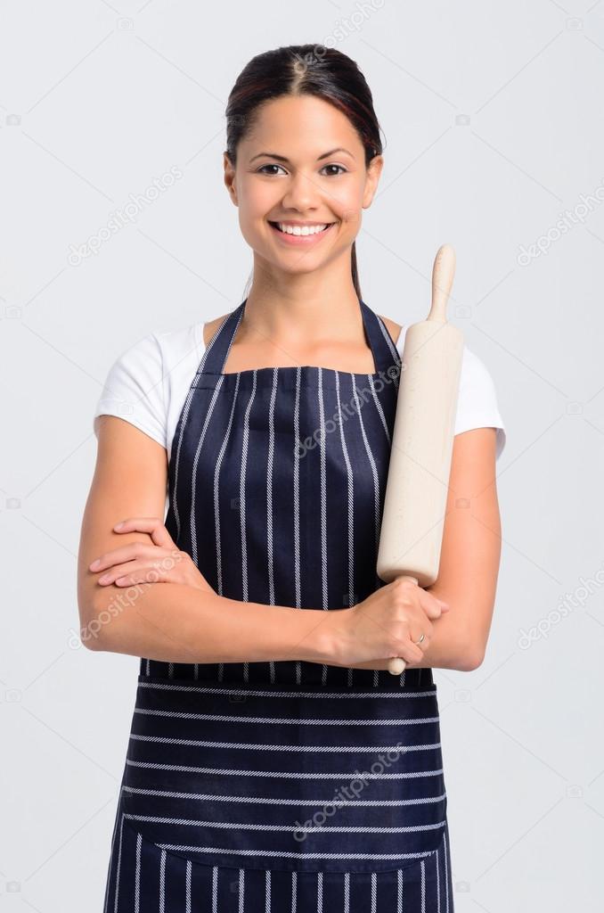 Portrait of a woman chef baker professional