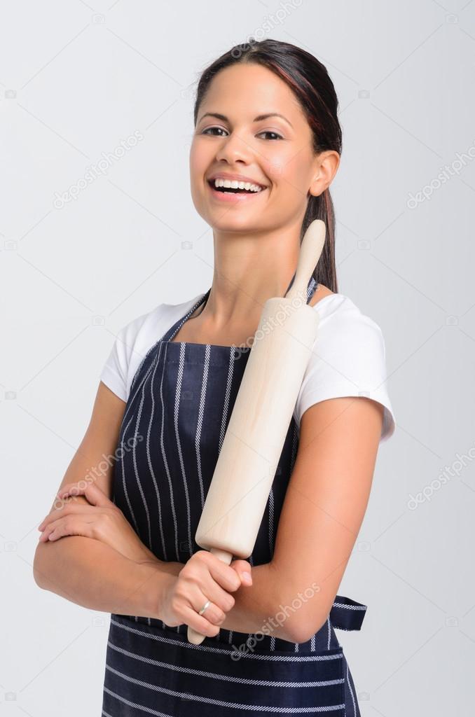 Portrait of a woman chef baker professional