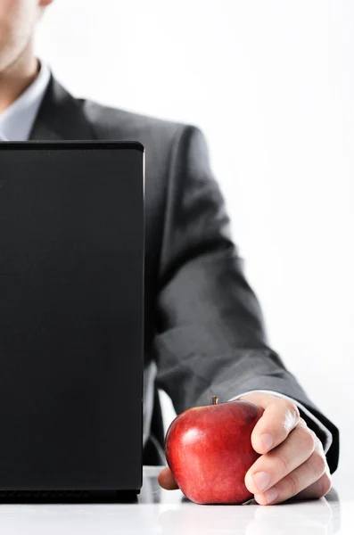 Geschäftsmann mit rotem Apfel — Stockfoto