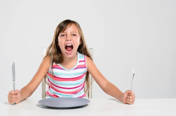 Rude screaming child at dinner — Stock Photo, Image