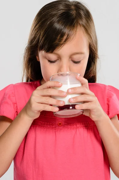 Young kid with glass of milk — Stock Photo, Image