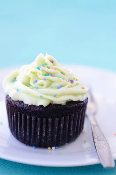 Cupcake com centenas e milhares — Fotografia de Stock