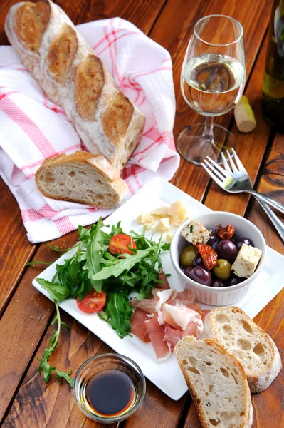 Rustic table setting with food — Stock Photo, Image