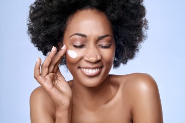 Skincare concept with black african model clipart