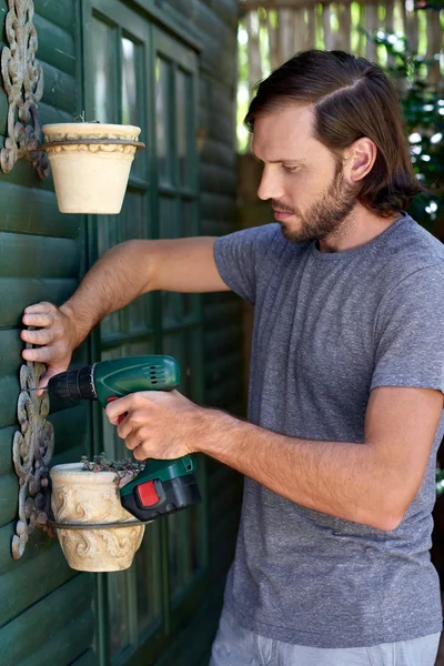 DIY male mounting potted plants — Stock Photo, Image