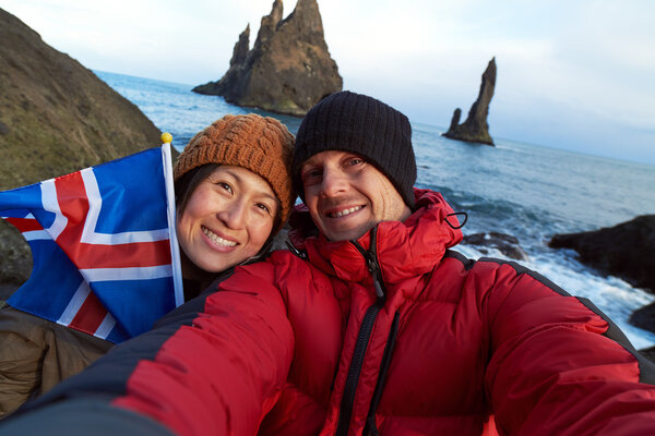 Tourist at Black sand beach reynisdrangar