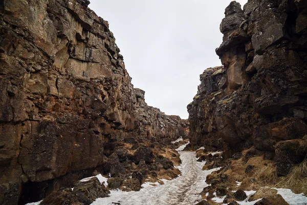 Rocky canyon between tectonic plates — Stock Photo, Image