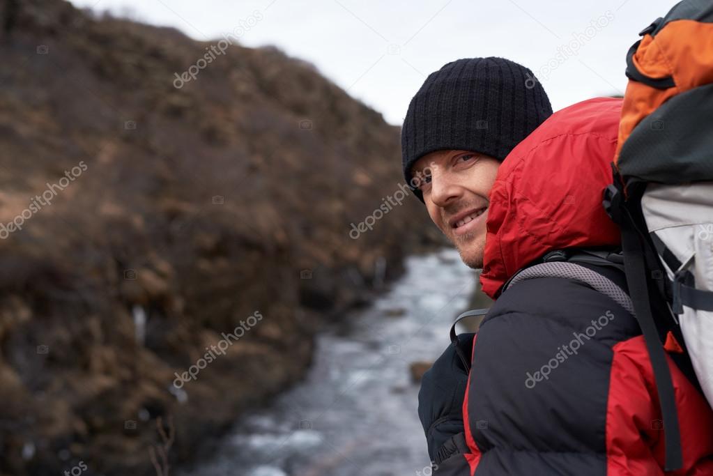 Smiling hiker man