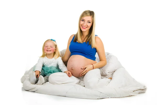 Pregnant woman with preschool daughter — Stock Photo, Image