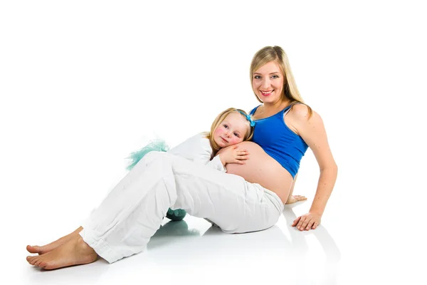 Pregnant woman with preschool daughter — Stock Photo, Image