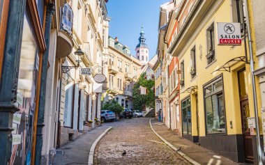 Baden-Baden, Germany - October 23, 2024: Baden-Baden center, overlooking colorful houses and the bell tower of the Stiftskirche church, in Baden-Wurttemberg, Germany