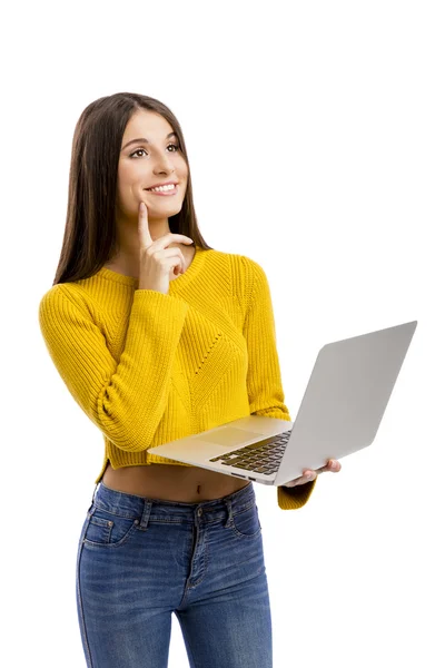 Menina trabalhando com um laptop — Fotografia de Stock