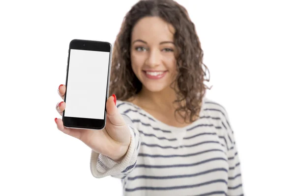 Vrouw iets te tonen op een mobiele telefoon — Stockfoto