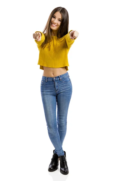 Teenage girl pointing towards camera — Stock Photo, Image