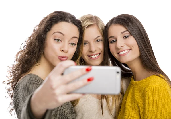 Girls taking selfie on smartphone — Stock Photo, Image