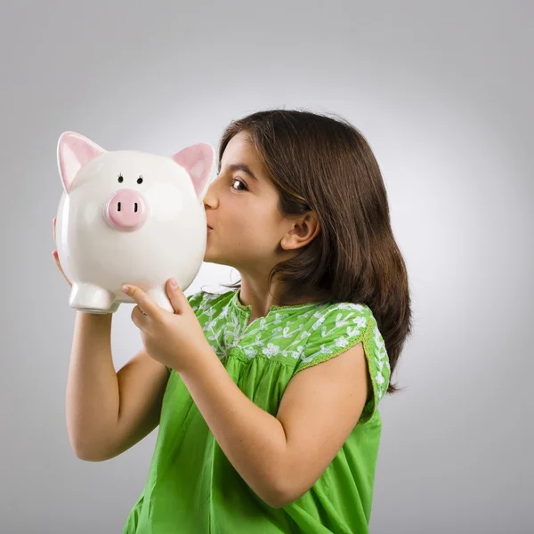 Jong meisje die houdt van een spaarpot — Stockfoto