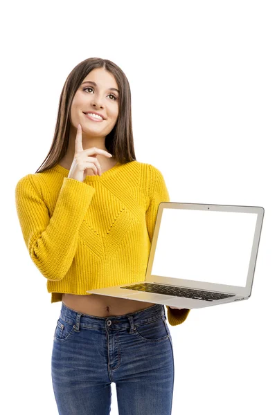 ノート パソコンで何かを示す女性 — ストック写真