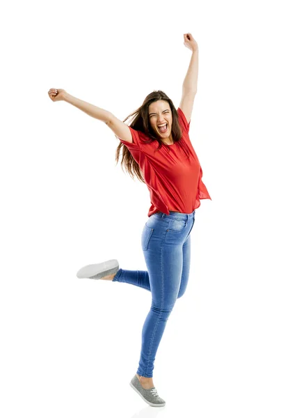 Szczęśliwa kobieta skoki z uniesionymi rękoma — Zdjęcie stockowe