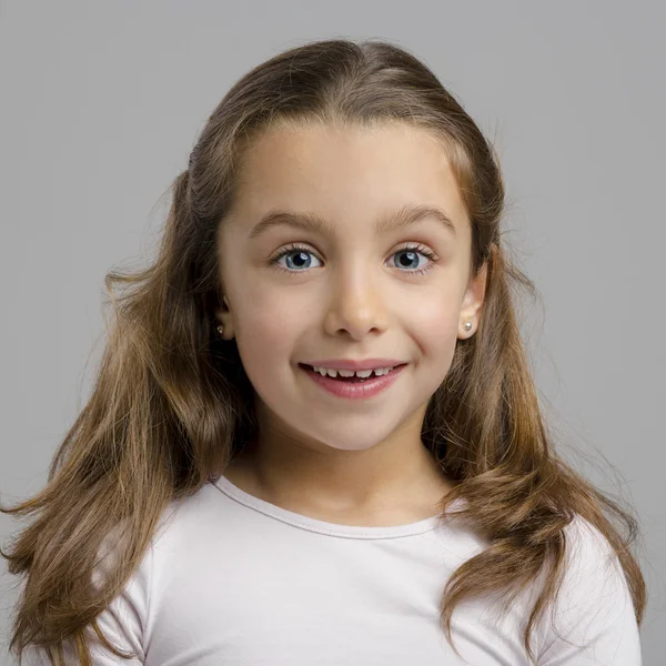 Menina feliz com uma expressão sorridente — Fotografia de Stock