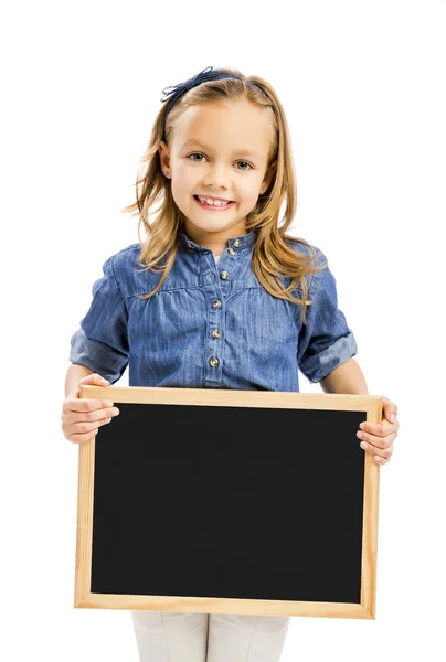 Menina segurando um quadro — Fotografia de Stock