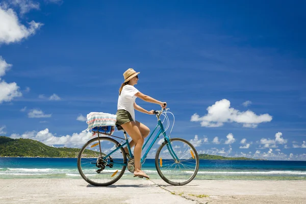 Woman ride along The Beach Stock Photo