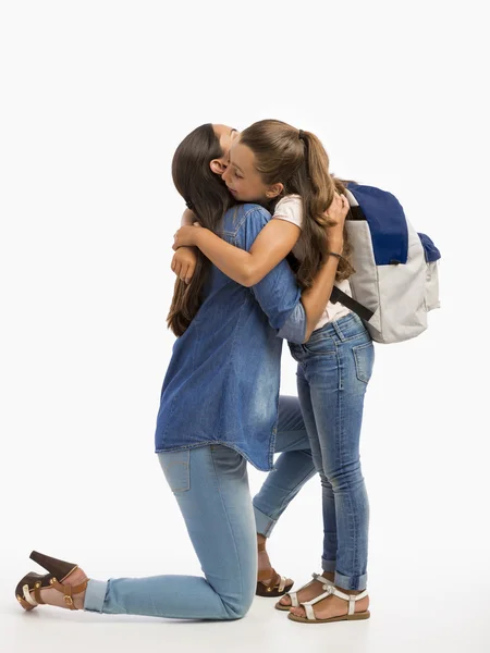 Mother hugging her little daughter — Stock Photo, Image