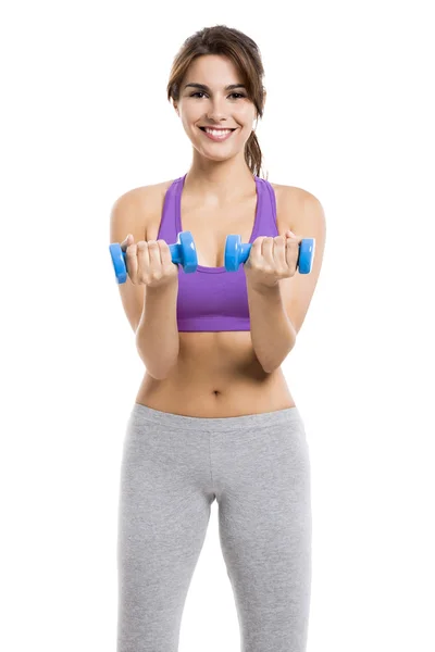 Athletic woman lifting weights — Stock Photo, Image