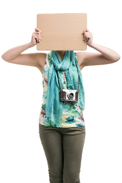 Woman holding a cardboard — Stock Photo, Image