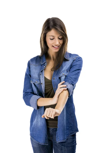 Woman rolling up her sleeves — Stock Photo, Image