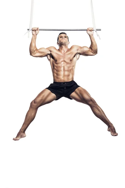 Músculo haciendo elevaciones —  Fotos de Stock