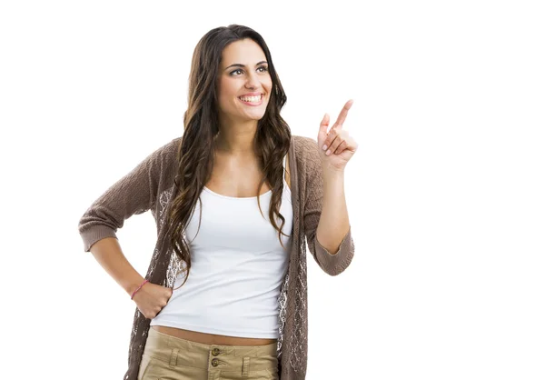 Beautiful woman pointing to something — Stock Photo, Image