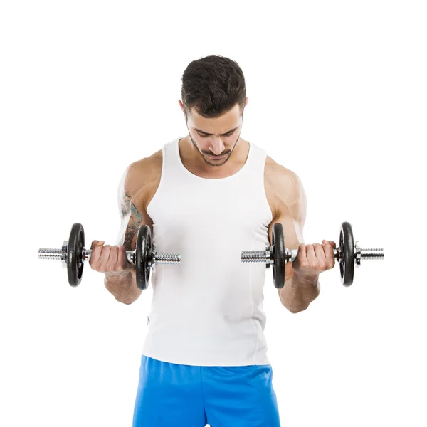 Athletic man lifting weights — Stock Photo, Image