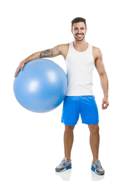 Hombre atlético con una pelota de pillados —  Fotos de Stock