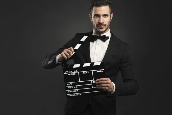 Man holding a clapboard — Stock Photo, Image