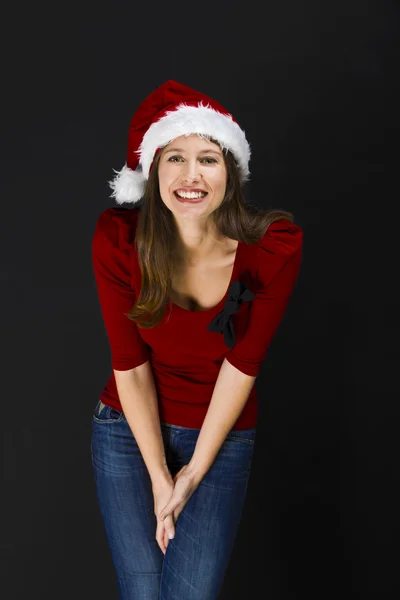 Belle femme portant un chapeau de Père Noël — Photo