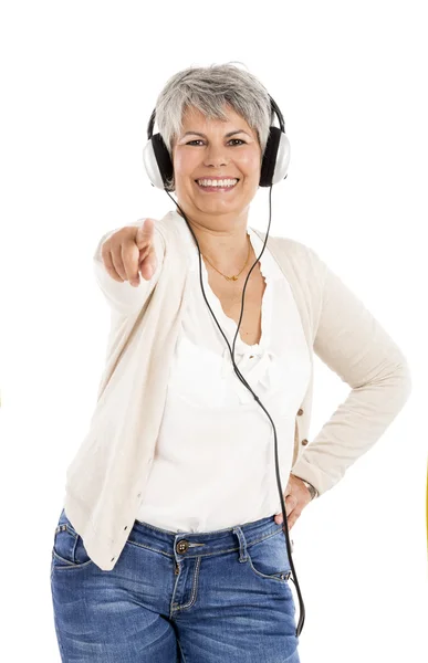 Idős asszony zenét hallgatni — Stock Fotó