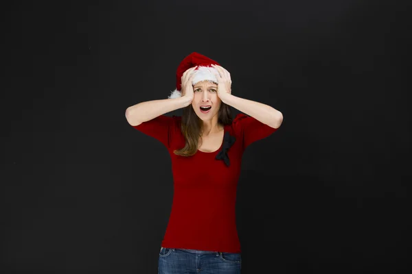 Mulher bonita vestindo um chapéu de Santa — Fotografia de Stock