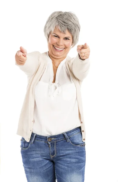 Happy Elderly woman pointing — Stock Photo, Image