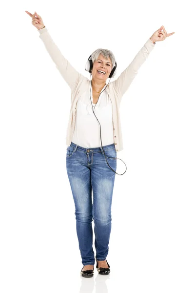 Elderly woman listen music — Stock Photo, Image