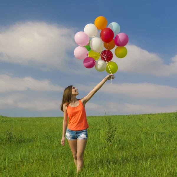 Flicka med ballonger — Stockfoto