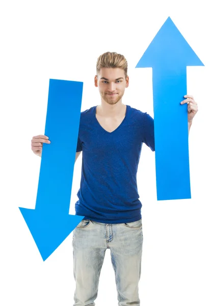 Young man holding  blue arrows — Stock Photo, Image