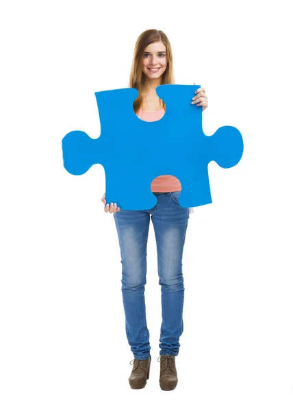 Woman holding a puzzle — Stock Photo, Image