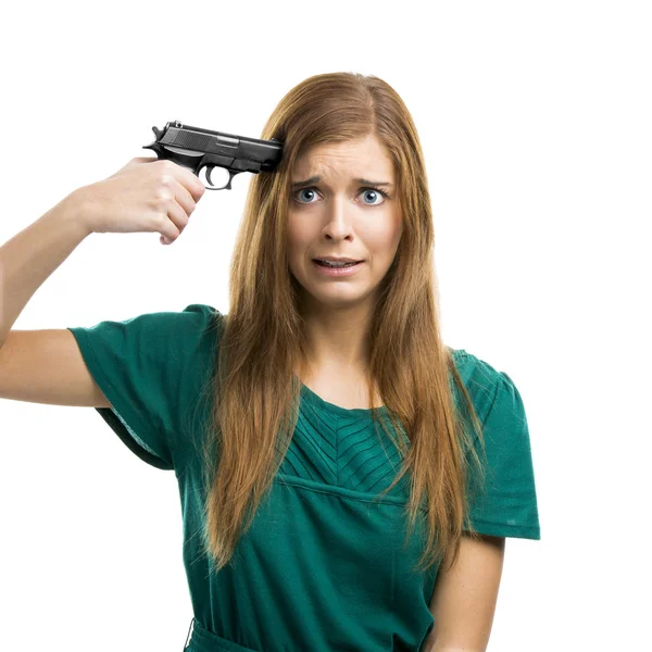 Pointing a gun on herself — Stock Photo, Image