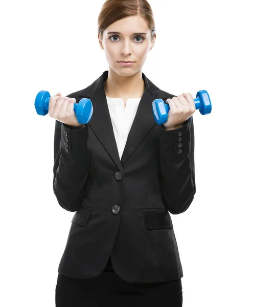 Business woman lifting weights — Stock Photo, Image